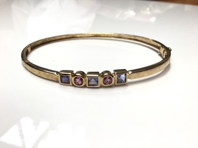 Lot 76 - 9ct gold gem set bangle