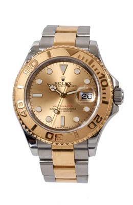 Lot 607 - Gentlemen’s Rolex Yacht-Master Oyster Perpetual Date gold and stainless steel wristwatch, with champagne dial, model 16623, 78763, serial number 8G738562. With box, papers, original tag and extra l...