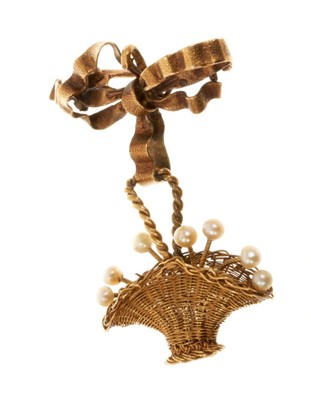 Lot 814 - 19th century gold and seed pearl brooch in the form of a finely woven gold basket holding seed pearl flowers, suspended from a gold bow.