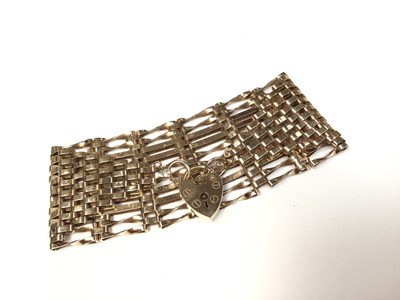 Lot 128 - 9ct gold gate bracelet with padlock clasp