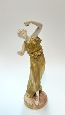 Lot 1233 - Royal Worcester figure of a dancing Maiden, modelled by James Hadley, date mark for 1902, shape no 1827, 34cm wide