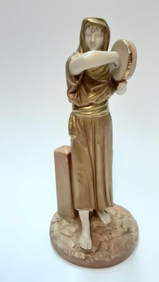 Lot 1236 - Royal Worcester figure of a female playing the tambourine, date mark for 1913, 23cm high