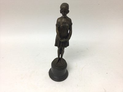 Lot 2424 - After Demetre Chiparus (1886-1947), bronzed figure of a woman standing on a stone base, signed, 34.5cm high