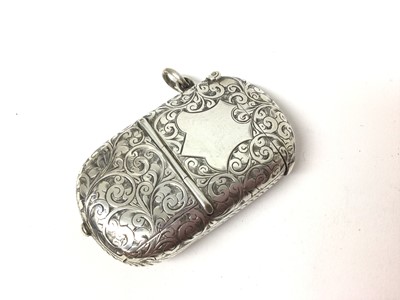 Lot 174 - Large late Victorian silver combination vesta and sovereign case with two fitted toothpicks, floral engraved decoration (Chester 1894) 6.2 x 4cm