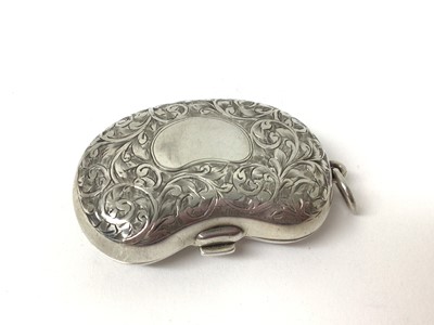 Lot 178 - Edwardian silver kidney-shaped double sovereign case with engraved floral decoration (Birmingham 1911) approx 5 cm