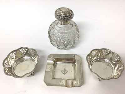 Lot 201 - Victorian silver mounted hobnail glass scent flask, two silver Bon Bon dishes and Festival of Britain 1951 silver ashtray (4)