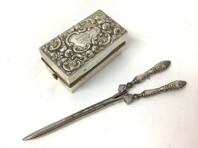 Lot 206 - Victorian silver hair curling tong burner in ornate embossed decorated case and pair silver mounted curling tongs (2)