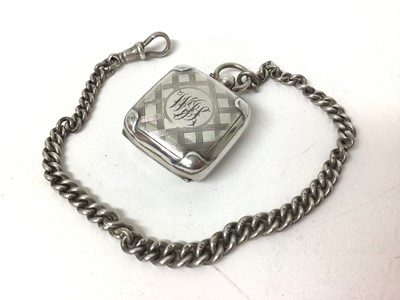 Lot 216 - George V silver sovereign case of purse form with basket weave decoration (Birmingham 1914) on silver chain