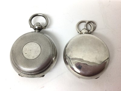 Lot 219 - Two Edwardian silver sovereign cases, one plain and one engine turned (2)