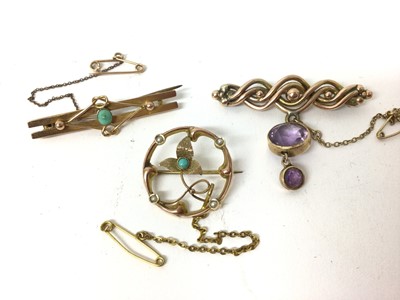 Lot 242 - 9ct gold turquoise bar brooch, together with a yellow metal turquoise and seed pearl brooch and another yellow metal stone-set brooch
