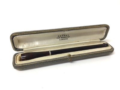 Lot 247 - Good quality Ladies  Asprey diamond-banded cigarette holder