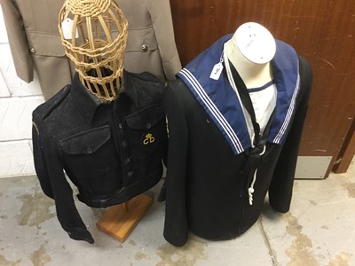 Lot 784 - Elizabeth II Civil Defence jacket together with Naval uniform on a torso (2)