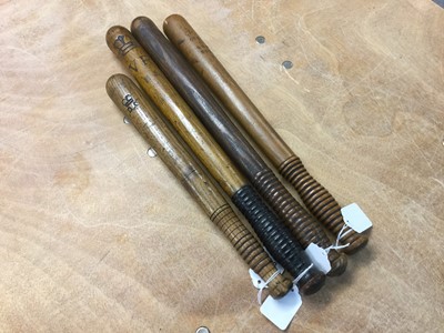Lot 805 - Four Victorian Police truncheons with stamped and carved marks 35-44 cm (4)