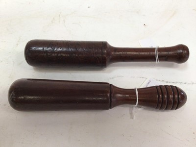 Lot 806 - Two Georgian plain turned mahogany tipstaffs 21.5 - 23 cm (2)