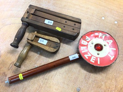 Lot 848 - German Police illuminated baton sign 'Halt Polizei' together with two British Police rattles (3)
