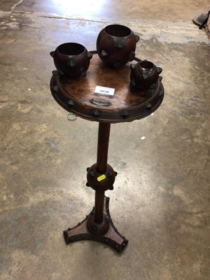 Lot 2436 - Unusual early 20th century gothic oak smokers stand, 78cm in height.