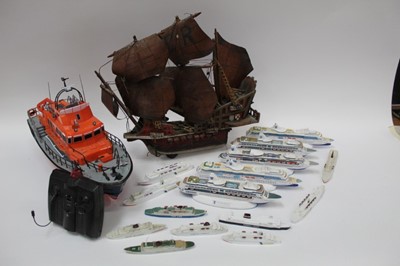 Lot 1892 - Lot model cruise ships, radio controlled lifeboat and wooden galleon