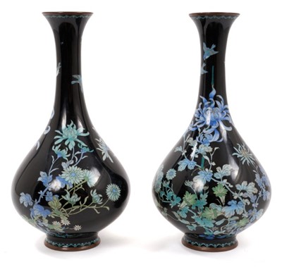 Lot 701 - Pair late 19th century Japanese cloisonné oviform vases with fine 
pale blue floral decoration on dark blue ground.