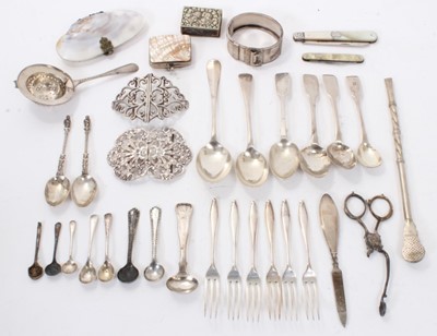 Lot 375 - Edwardian silver nurses buckle, (Birmingham 1907), together with another white metal buckle and collection of various silver and white metal flatware