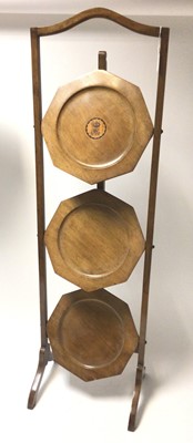 Lot 122 - H.M.Queen Mary’s folding cake stand with Royal cipher