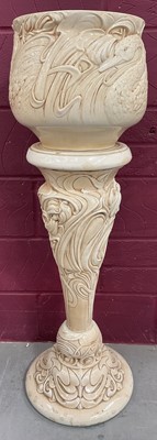 Lot 97 - Art Nouveau white pottery jardinère on stand