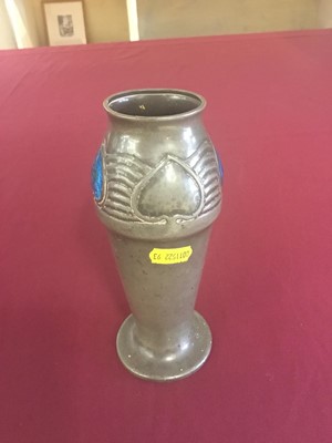 Lot 731 - Archibald Knox for Liberty style pewter and cabochon enamel vase