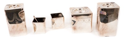 Lot 717 - Art Nouveau silver plated cube teaset and two matching ceramic 
cups and saucers.
