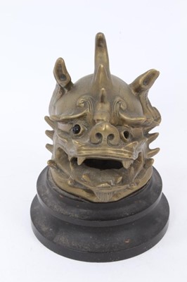 Lot 1058 - Antique Chinese bronze censer cover in the form of a dragons 
head