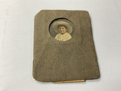 Lot 1508 - Rare photographic portrait of a young child, believed to be an early portrait of Lawrence Olivier, inscribed verso 'Lawrence Olivier, aged 2 years, 1910, taken at Dorking, in card frame.