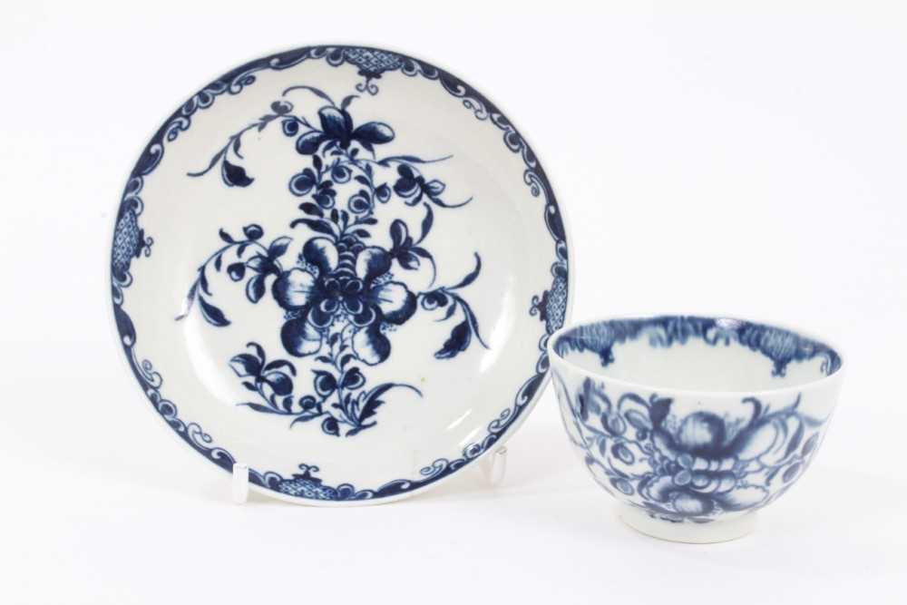Lot 6 - A Worcester blue and white tea bowl and saucer, circa 1757-80, painted with the Mansfield pattern, crescent marks, the saucer measuring 10.75cm diameter