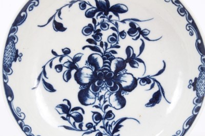 Lot 6 - A Worcester blue and white tea bowl and saucer, circa 1757-80, painted with the Mansfield pattern, crescent marks, the saucer measuring 10.75cm diameter