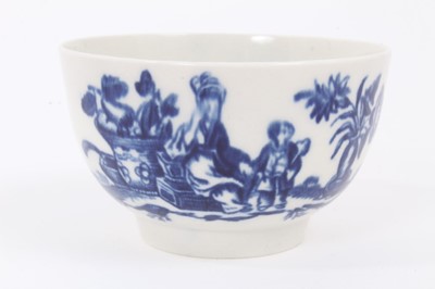 Lot 7 - A Worcester blue and white tea bowl and saucer, circa 1775-85, printed with the Mother and Child pattern, the saucer blue-lined and measuring 12.5cm diameter