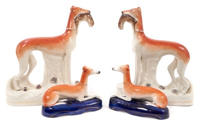 Lot 120 - Four 19th century Staffordshire pottery greyhounds