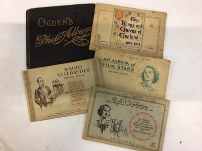 Lot 1431 - Cigarette cards - Ogden's album containing Guinea Gold actresses, Tab Leading Footballers, Athletes and Artists