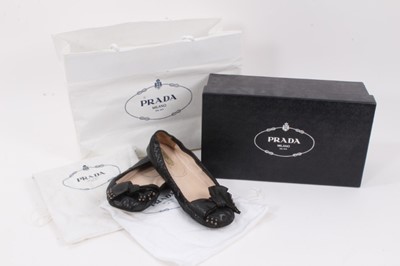 Lot 2053 - Pair of  Prada shoes, black leather pumps with metal studs.