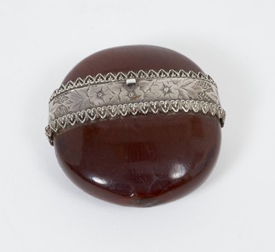 Lot 257 - Late 18th/early 19th silver mounted Sea Bean vinaigrette of circular form.