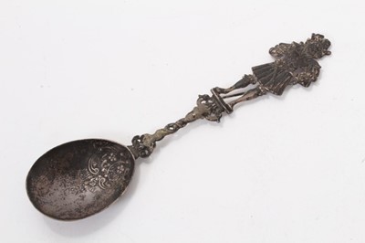 Lot 524 - 19th century Dutch silver serving spoon, the terminal modelled as a male figure, 24.5cm in overall length.