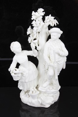 Lot 51 - A Derby bisque group emblematic of Autumn and Summer, late 18th/early 19th century, modelled as a huntsman with gun standing next to a woman holding a basket of flowers, in front of a tree with a w...