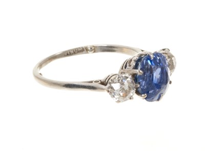 Lot 408 - A fine sapphire and diamond three stone ring