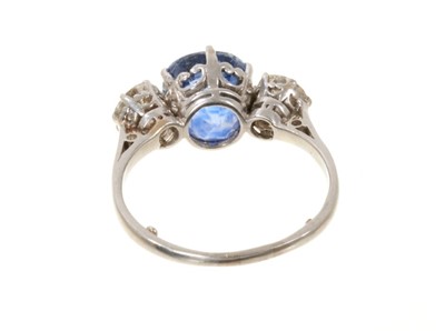 Lot 408 - A fine sapphire and diamond three stone ring