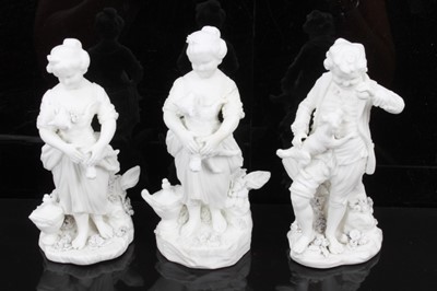 Lot 55 - A pair of Derby bisque figures of a barefooted boy and girl, late 18th/early 19th century, the boy playing with a dog and the girl holding a lamb, incised model numbers 57, together with another De...