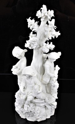 Lot 56 - A rare Derby bisque group of figures and animals around a tree, late 18th/early 19th century, incised model number 334, 28cm high