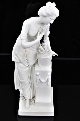 Lot 58 - A Derby bisque figure of a female gardener, late 18th/early 19th century, shown tending to a potted plant standing on a plinth, incised model number 359, 23.5cm high