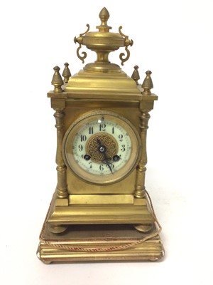 Lot 893 - Late 19th century French gilt brass mantel clock with enamelled and gilt metal dial, French movement striking on bell signed J.Mati in gilt metal case on plinth , pendulum and key present 30.5 cm