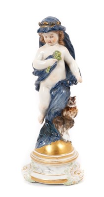Lot 138 - A Meissen porcelain figure, emblematic of night, modelled as putti wearing a dark cloak with star head band and owl seated beside, cross swords mark to base and incised M 106, 18cm high