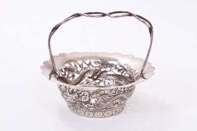 Lot 285 - Late 19th/early 20th century Chinese silver dish of circular form with pierced dragon decoration
