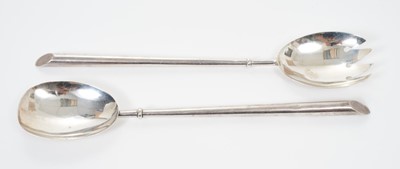 Lot 286 - Pair George V silver Art Deco style salad servers, with tapering tubular handles