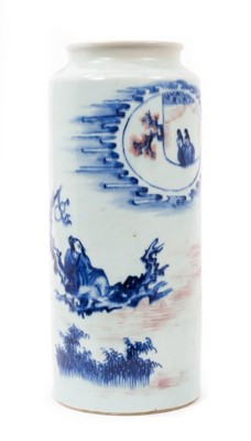 Lot 126 - A Chinese Transitional-style sleeve vase, 19th/20th century, decorated in underglaze blue and red with a figural scene, 26cm high