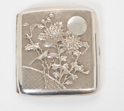 Lot 342 - Late 19th/early 20th century Chinese silver cigarette case of shaped form, the cover with raised Chrysanthemum decoration and vacant cartouche, the rear with raised Dragon decoration, silver gilt i...