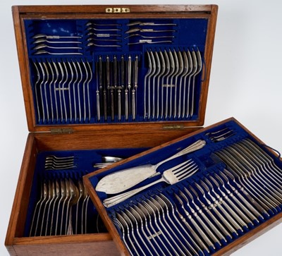 Lot 355 - Extensive canteen of Edwardian silver cutlery (Birmingham 1907), maker Elkington & Co, each piece with engraved armorial, comprising, x1 pair of fish servers, x3 mustard spoons, x12 fish forks, x12...